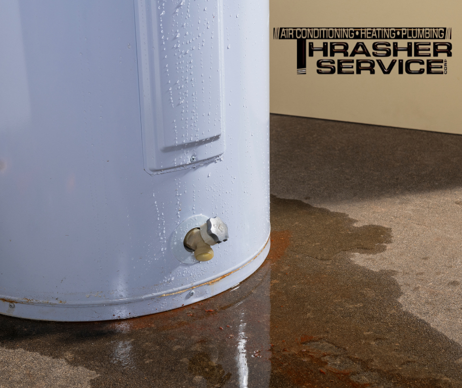 a picture of a leaking water heater about to be replaced by the water heater replacement experts at Thrasher Service of Des Moines