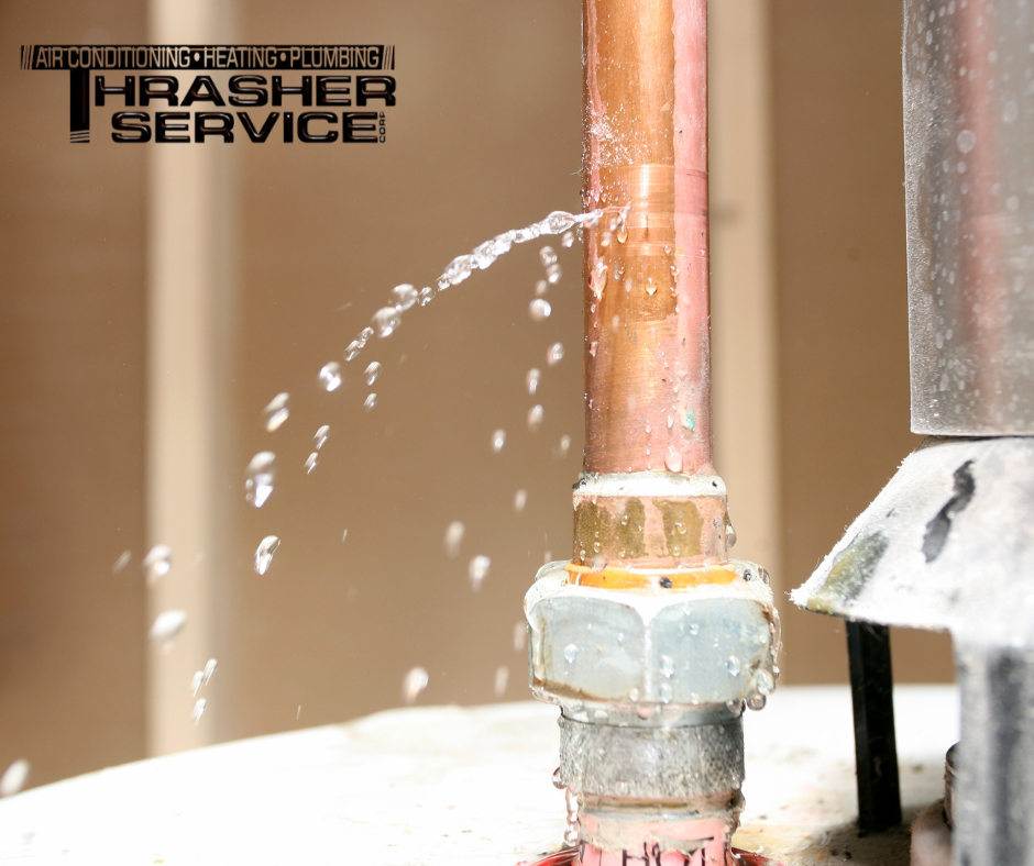 A leaking pipe in a Des Moines home before being repaired by Thrasher Service of Des Moines. 