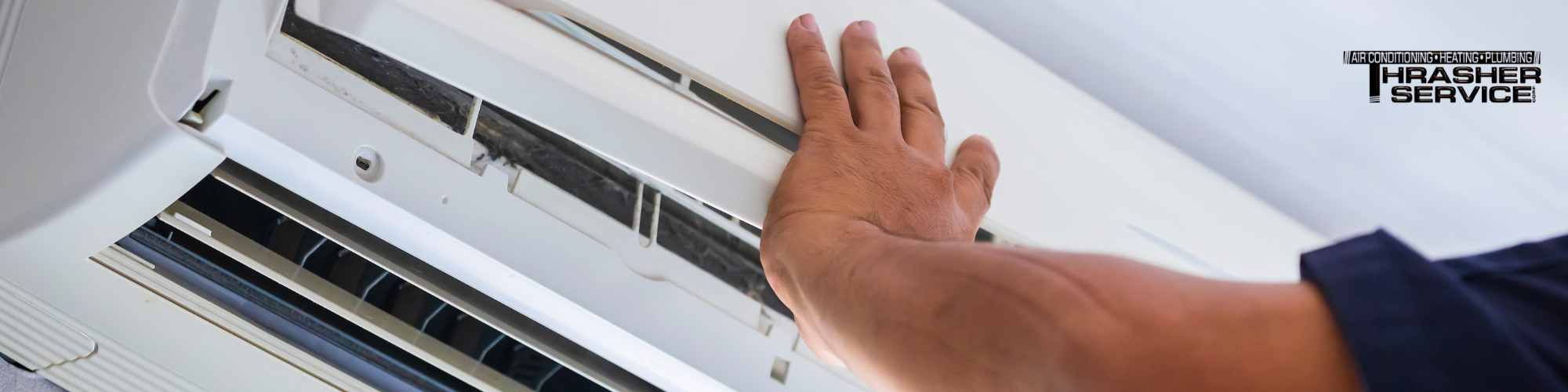 A ductless mini=split air conditioner being serviced by Thrasher Service in Des Moines, Iowa. 