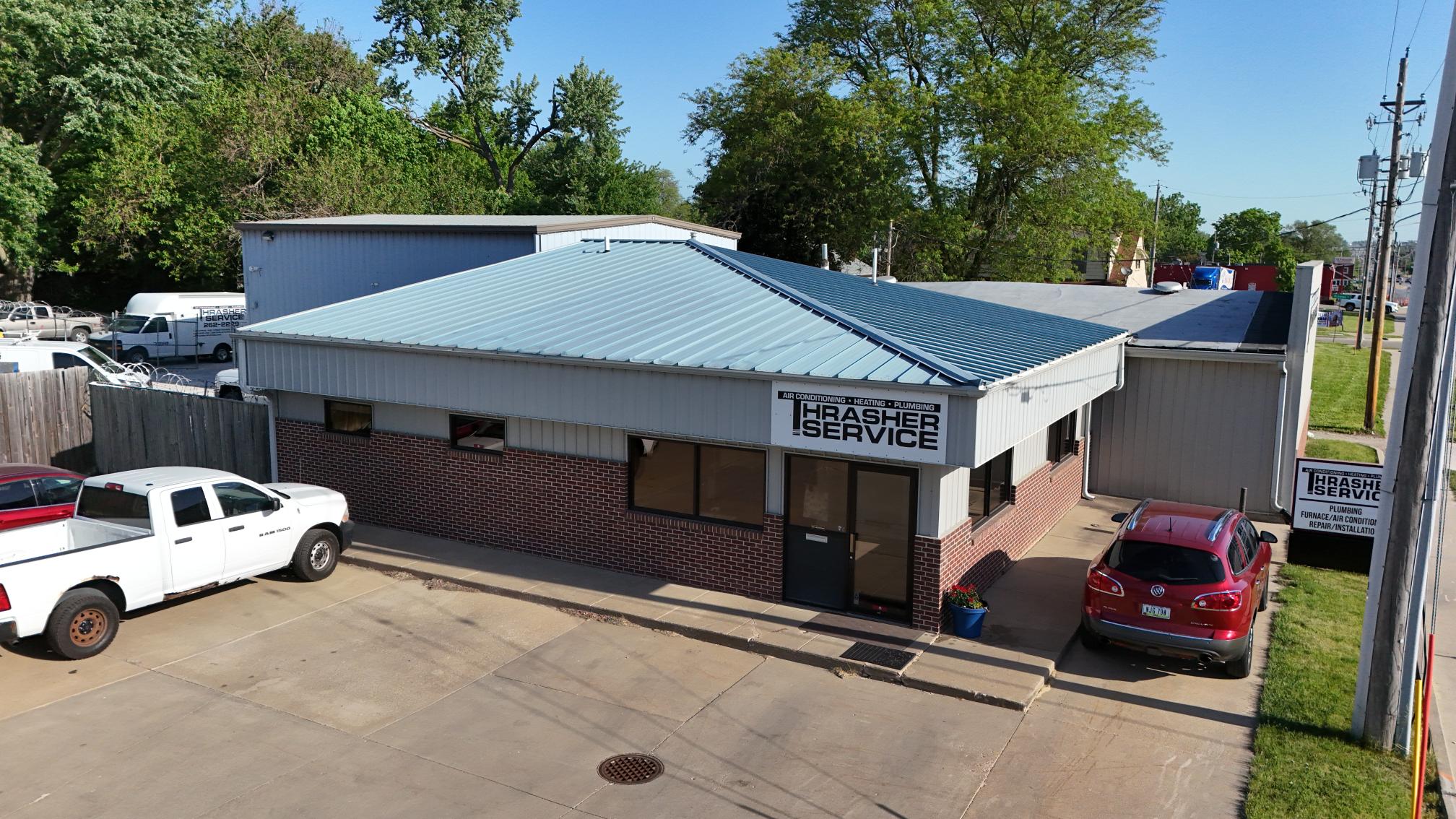 A image of Thrasher Service, a Des Moines area heating, cooling, and plumbing company serving homeowners and businesses since 1978.